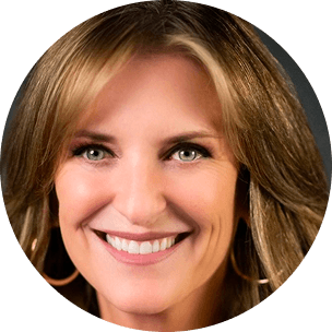 Smiling woman with shoulder-length brown hair Smiling woman with shoulder-length brown hair