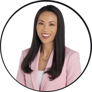 Smiling woman in a pink blazer Smiling woman in a pink blazer