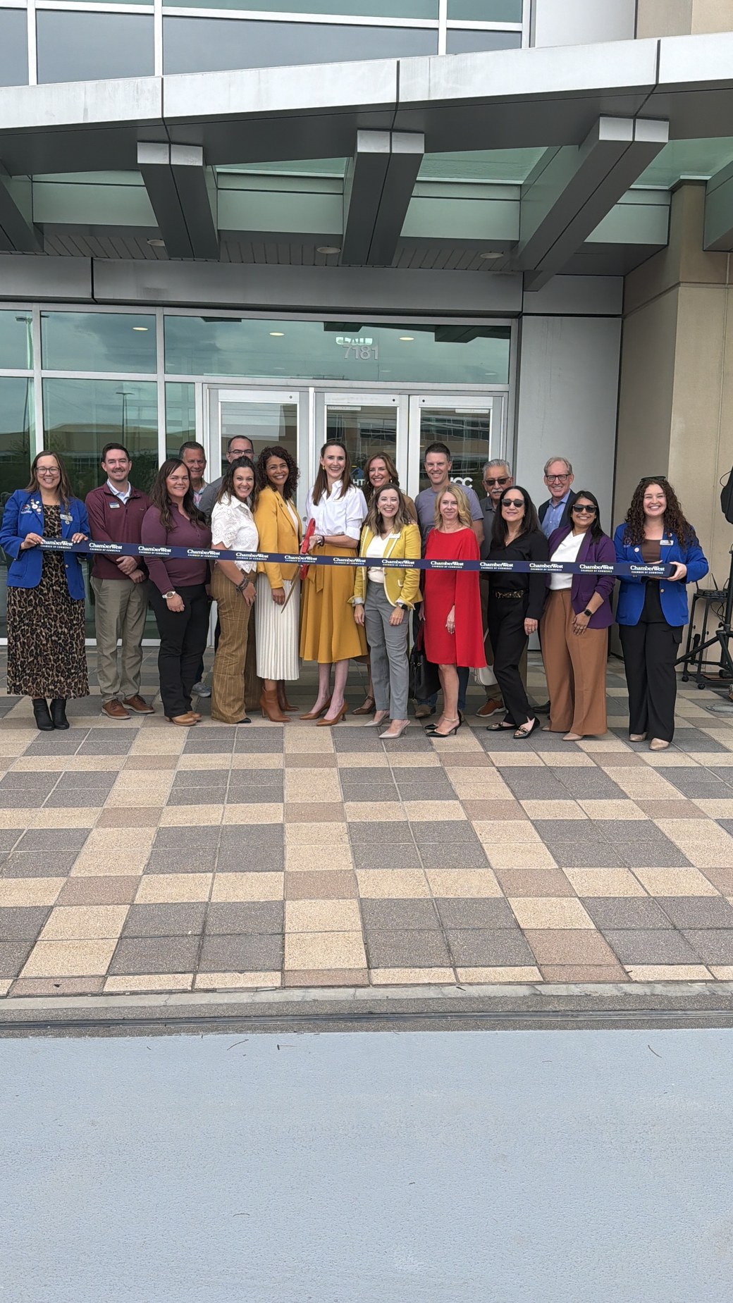 Sego Leadership office ribbon cutting Sego Leadership team and ChamberWest members at the ribbon cutting outside the West Jordan office